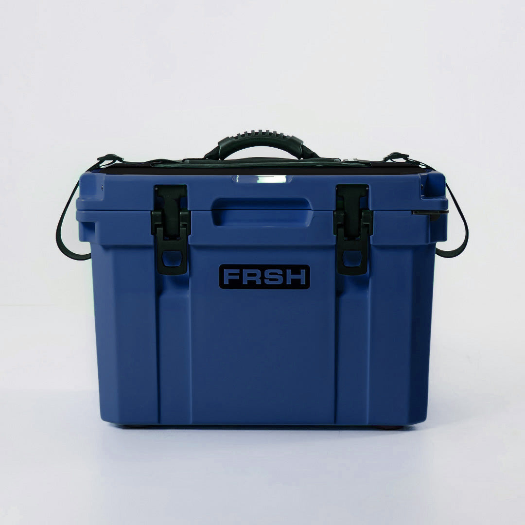 FRSH 17L hard cooler in frozen blue, showing sturdy insulated design and secure lid for outdoor cooling.