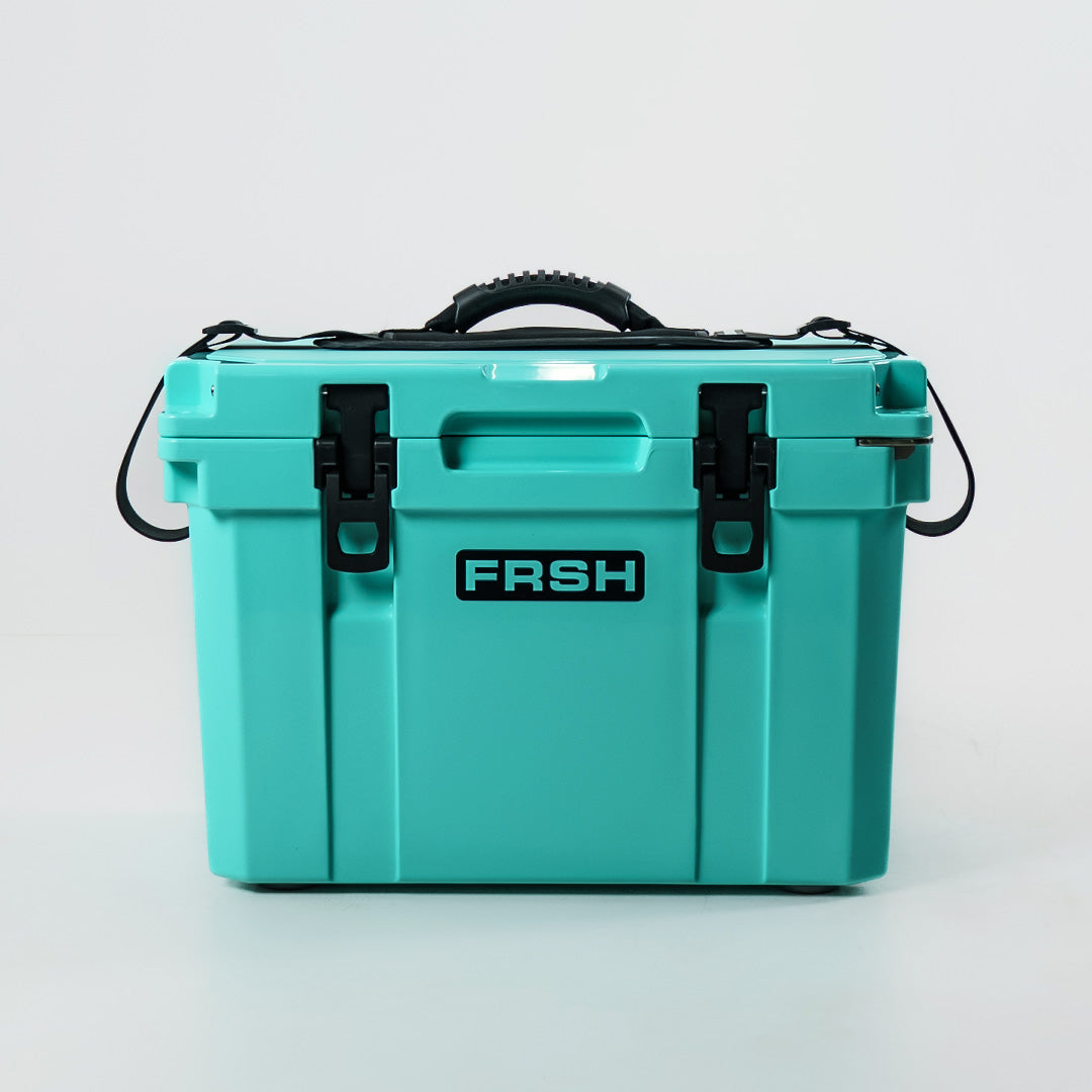 FRSH 17L cooler with Sea Moss color features a shoulder strap and handle for easy carrying and transport.