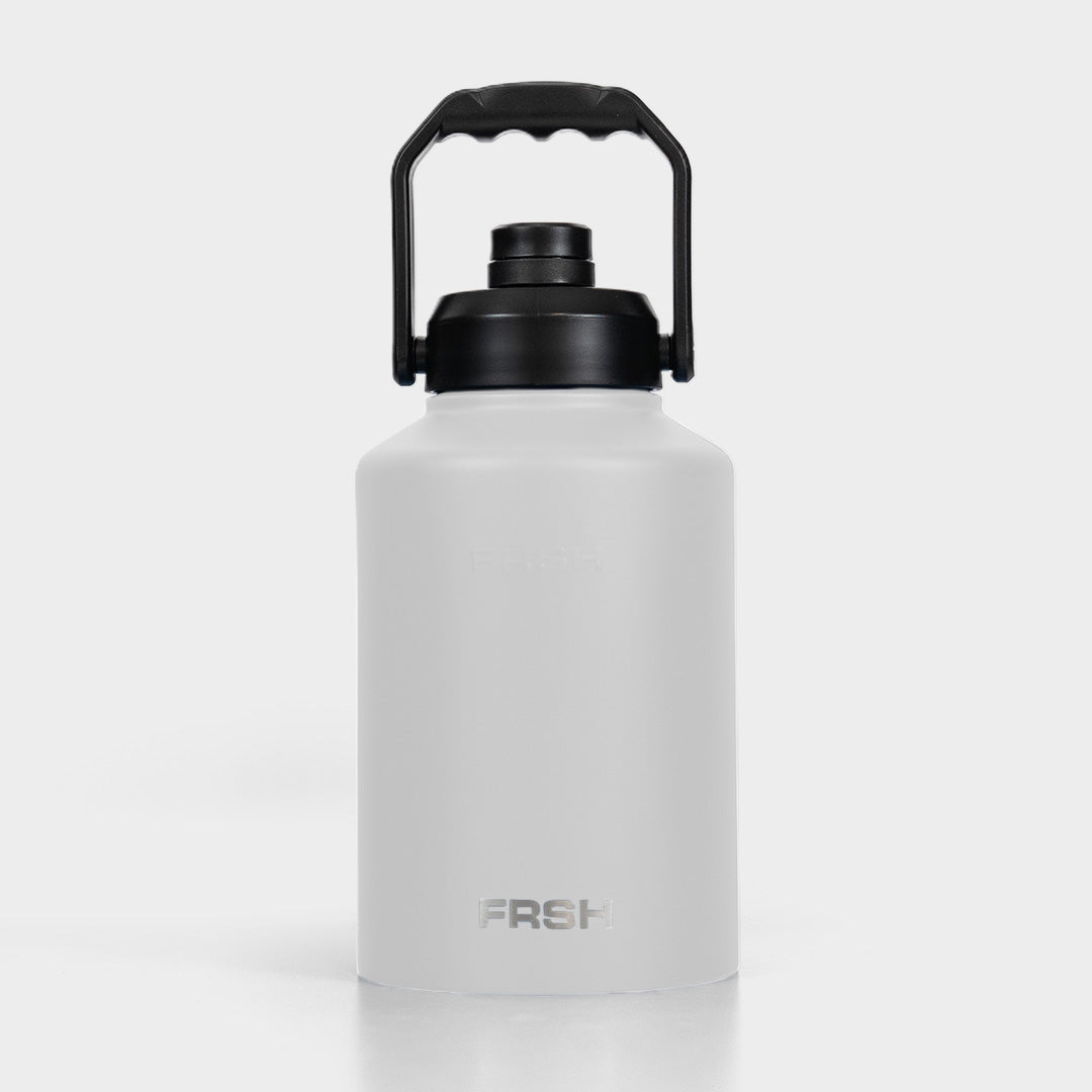 White 3.8L FRSH bottle with chug lid, large water bottle for hydration, featuring a durable design and wide mouth opening.