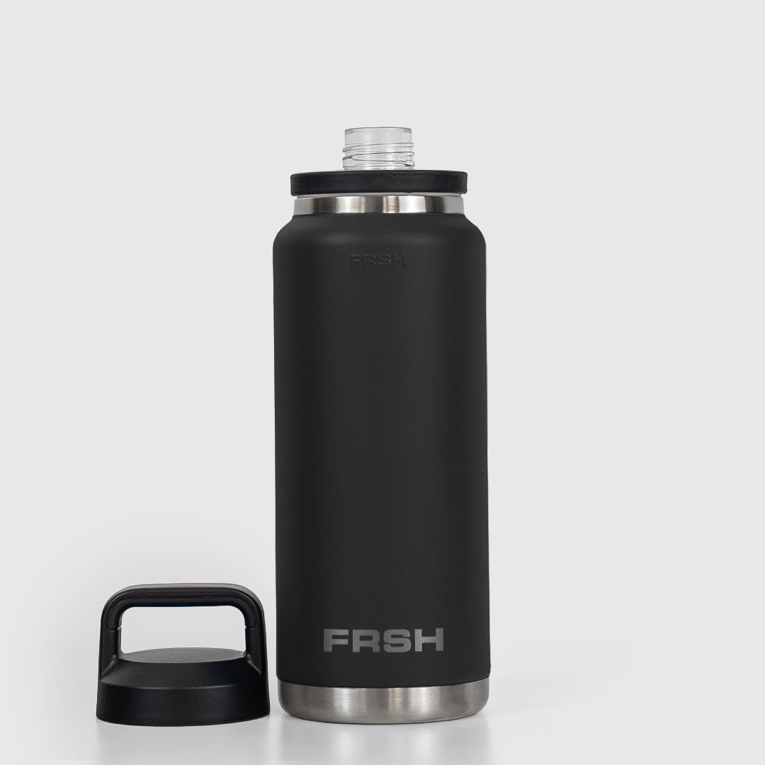 Black 750ml FRSH bottle with chug lid, stainless steel tumbler for beverages, durable and leak-proof design.