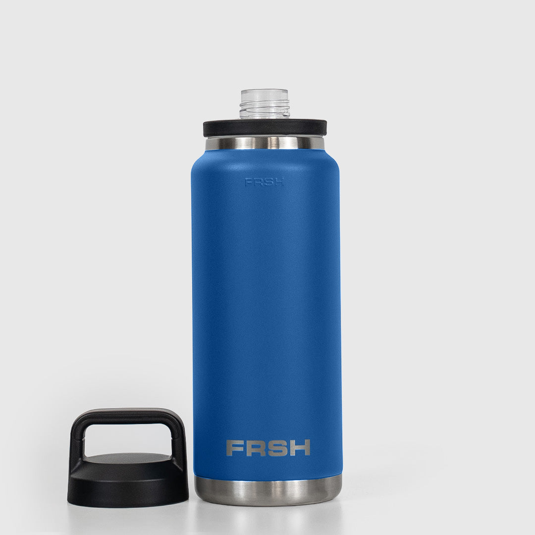 Dark blue 1000ml FRSH bottle with chug lid, durable tumbler for hydration, featuring a sleek design and secure lid.