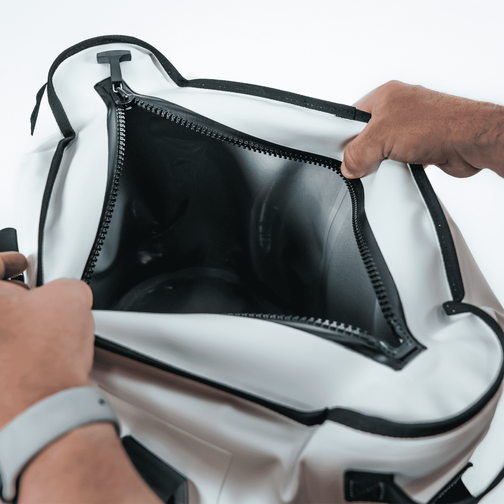 Open FRSH 30L soft cooler showing insulated interior with adjustable straps and durable fabric for outdoor use.