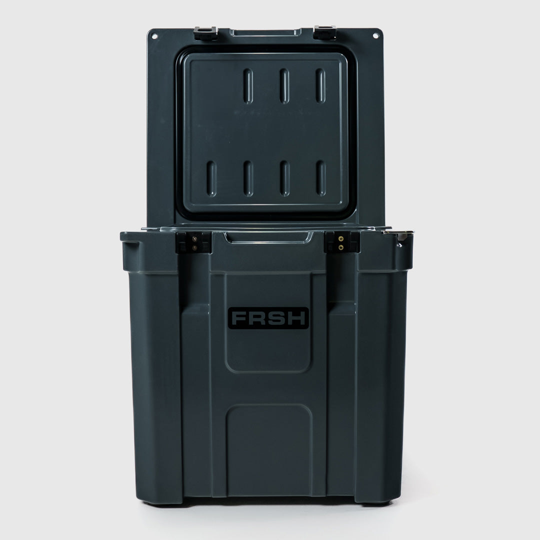 FRSH 33L hard cooler with black carbon finish, sturdy design, and secure latch for keeping food and drinks cold.