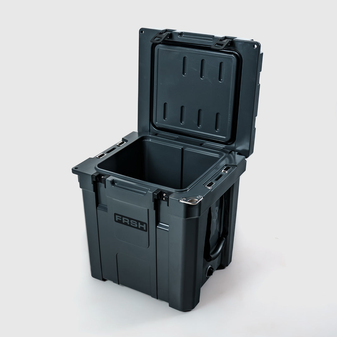 FRSH 33L hard cooler with carbon finish, durable insulated container for keeping drinks and food cold outdoors.