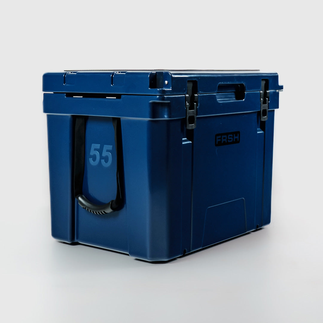 FRSH 55L hard cooler in frozen blue with sturdy handle and secure latch, ideal for outdoor adventures and keeping items cold.