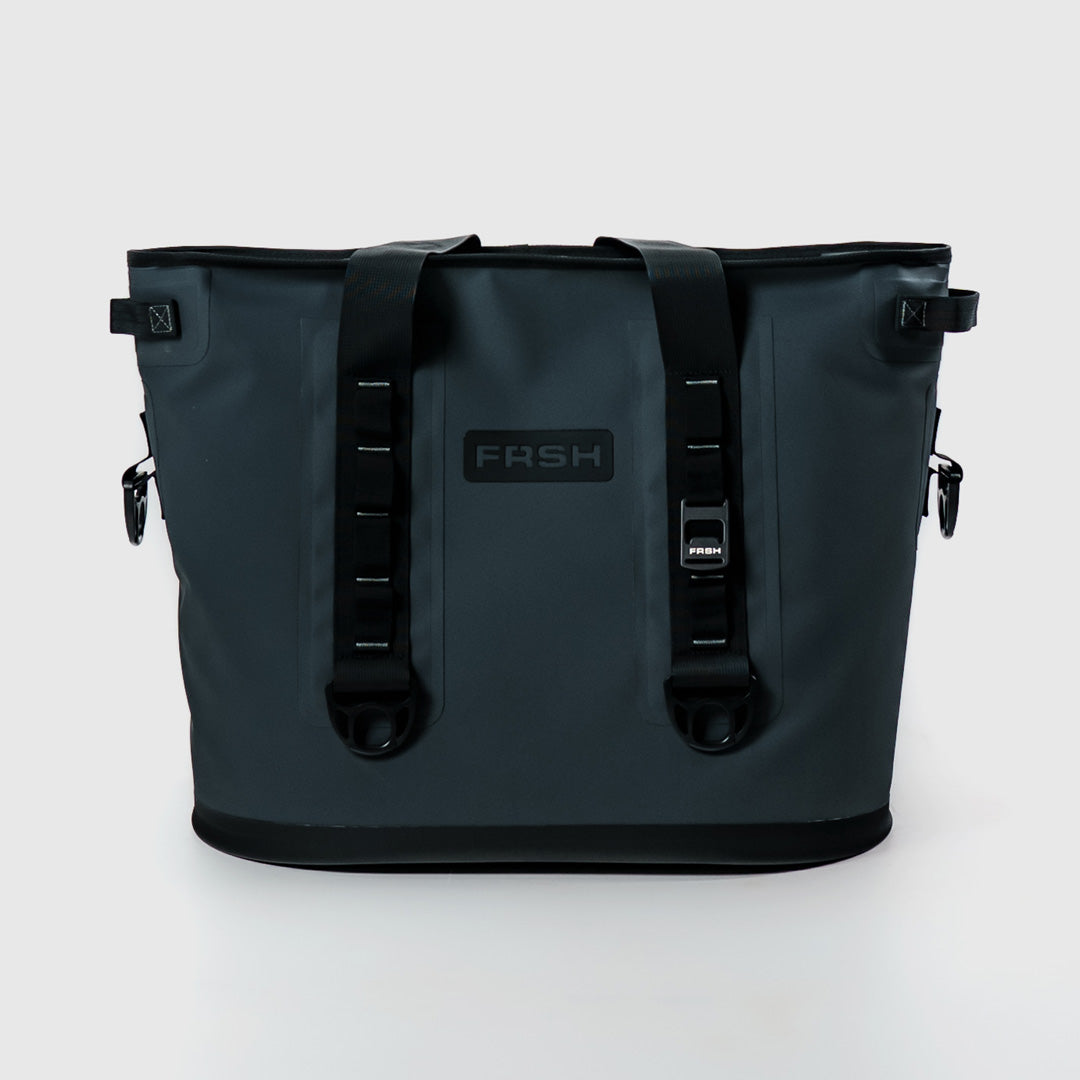FRSH 30L soft cooler in carbon color, insulated soft cooler bag with adjustable shoulder strap and multiple storage compartments.
