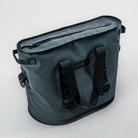 FRSH 30L soft cooler with carbon-colored exterior, insulated fabric, and adjustable shoulder strap for portable cooling.