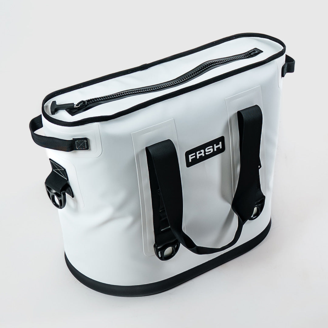FRSH 30L soft cooler in whiteout color showing durable fabric and zip closure for portable cold storage.